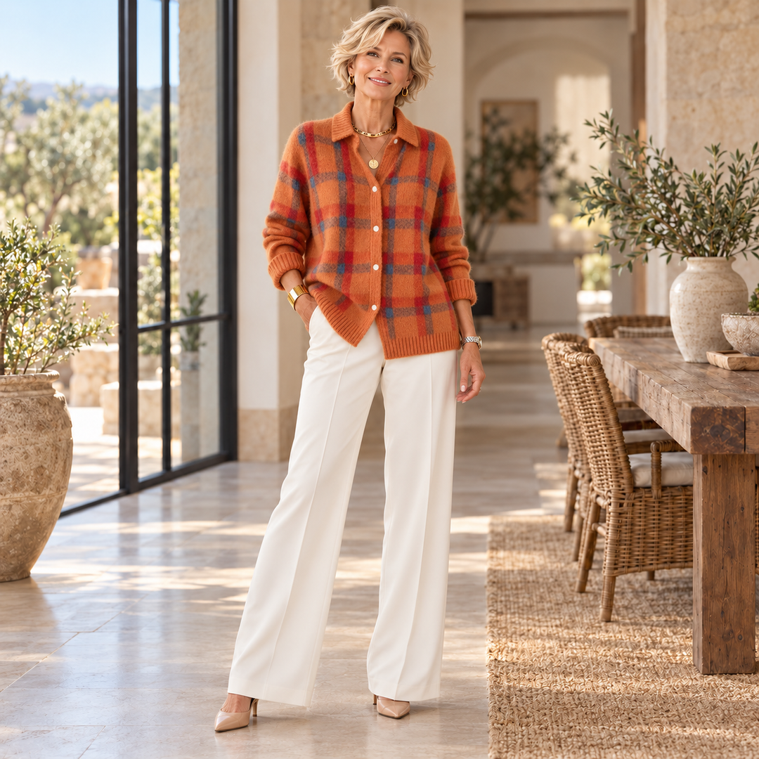 Camille™ | Plaid Cardigan worn by a mature blonde woman in a sunlit Mediterranean home