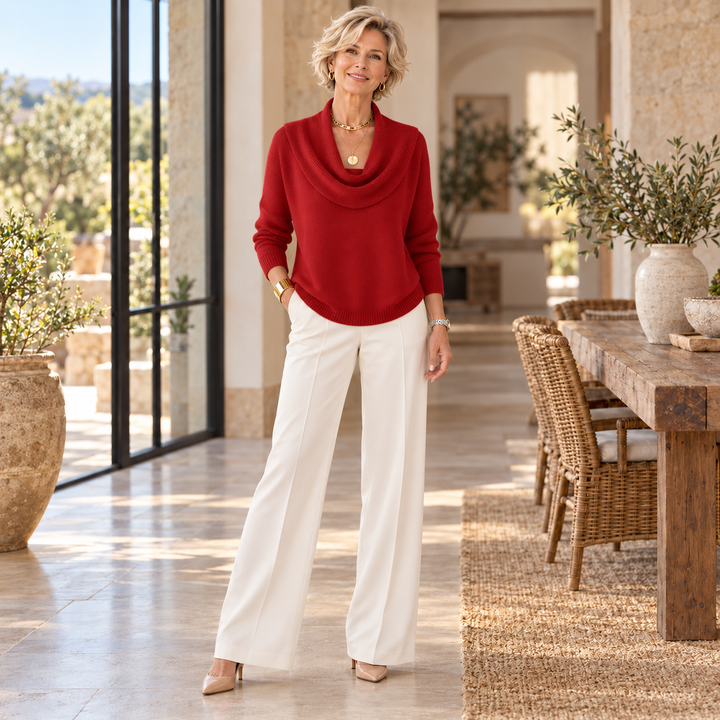 Juliette™ | Cowl Neck Sweater worn by a mature blonde woman in a sunlit Mediterranean home